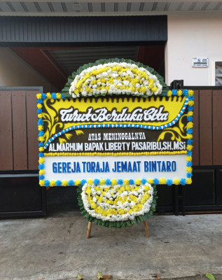 Papan Bunga Duka di Dahana Tabaloho